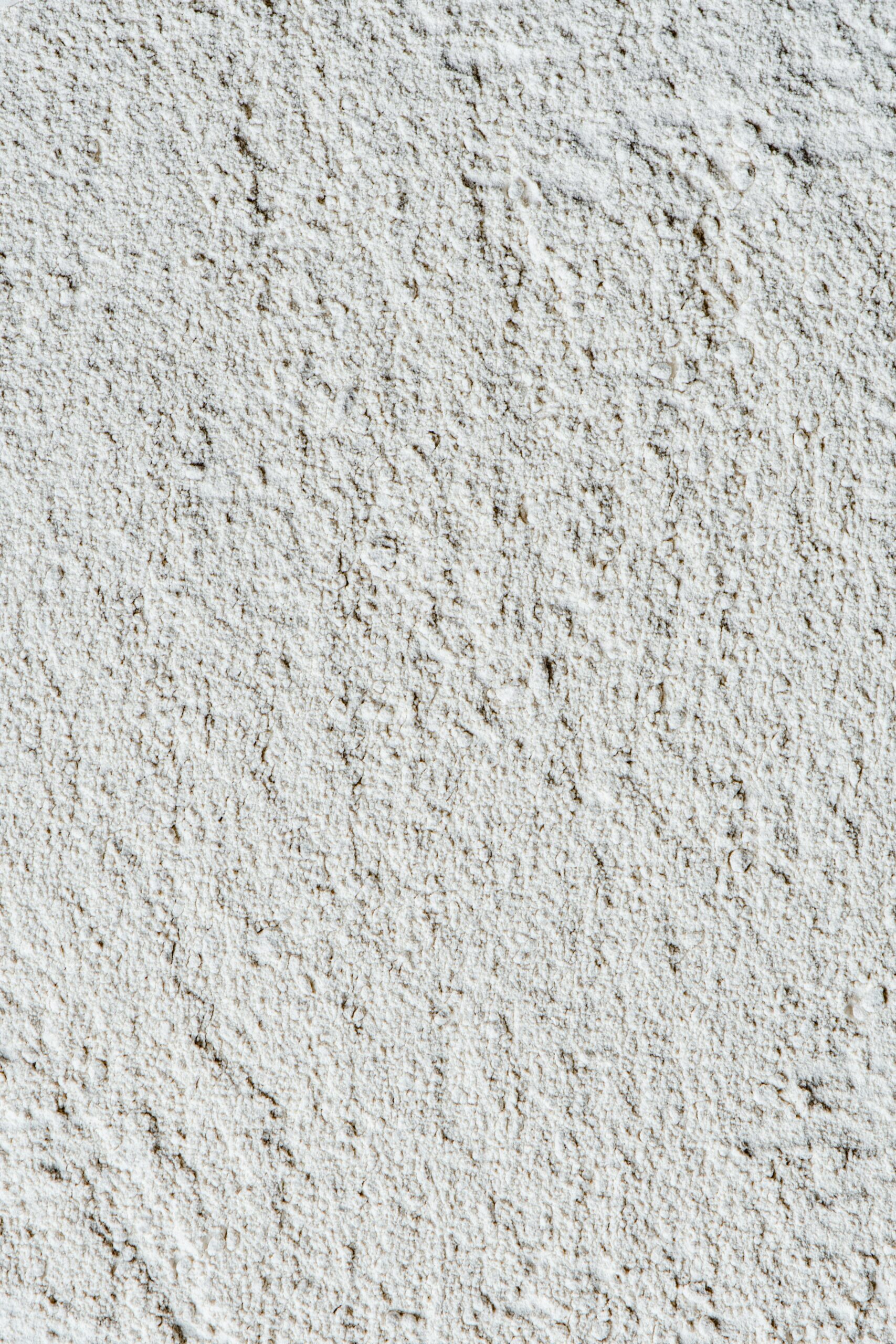 Close-up of a textured kaolin clay surface showcasing natural patterns.
